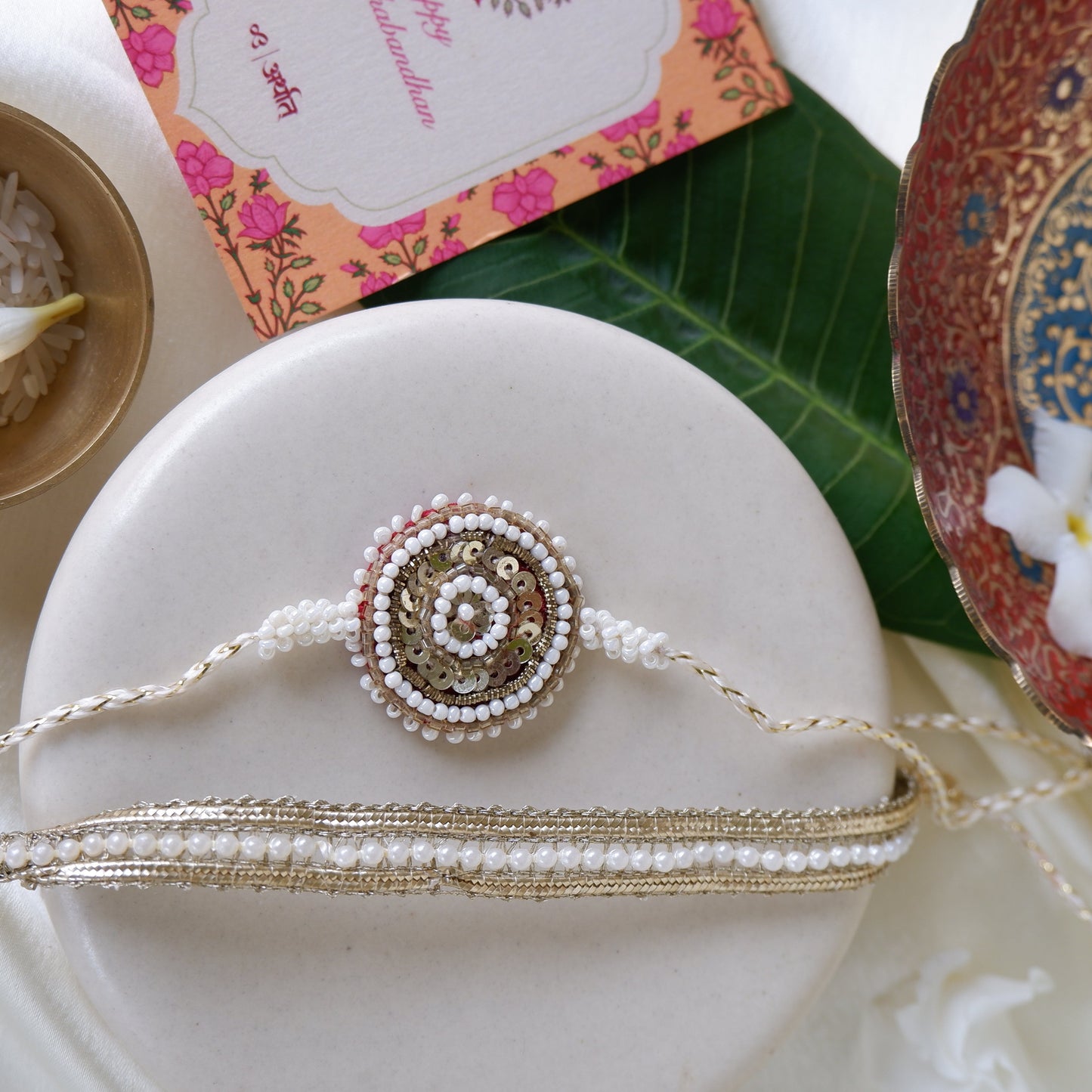 White Pearl Rakhi - Set of two