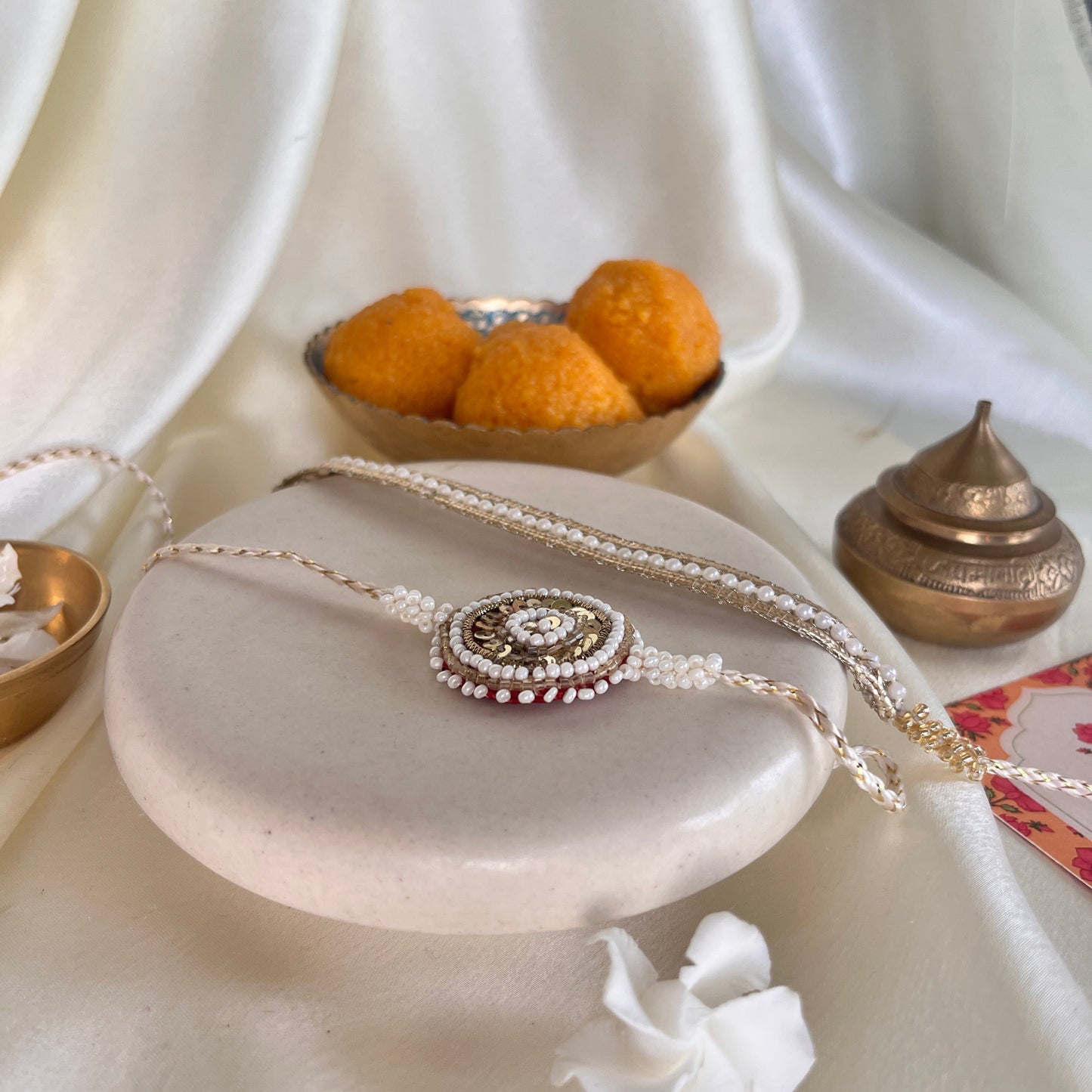 White Pearl Rakhi - Set of two